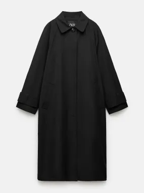 Oversize water-repellent black trench coat