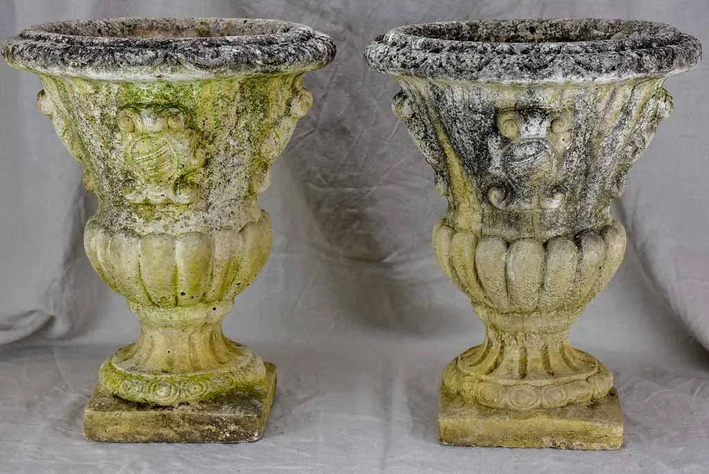 Pair of 1940's French Medici urns with coat of arms