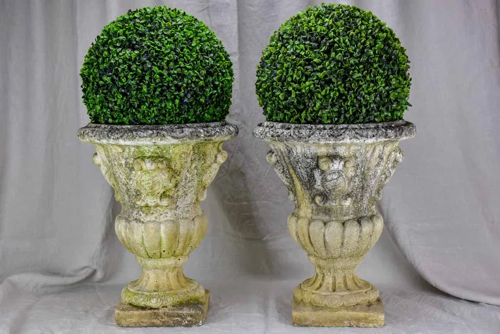 Pair of 1940's French Medici urns with coat of arms